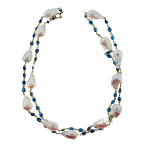 Long blue sapphire and baroque pearl necklace in 18k gold
